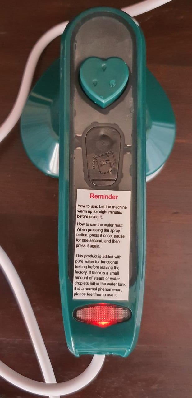Mondee Mini Portable Steam Iron.